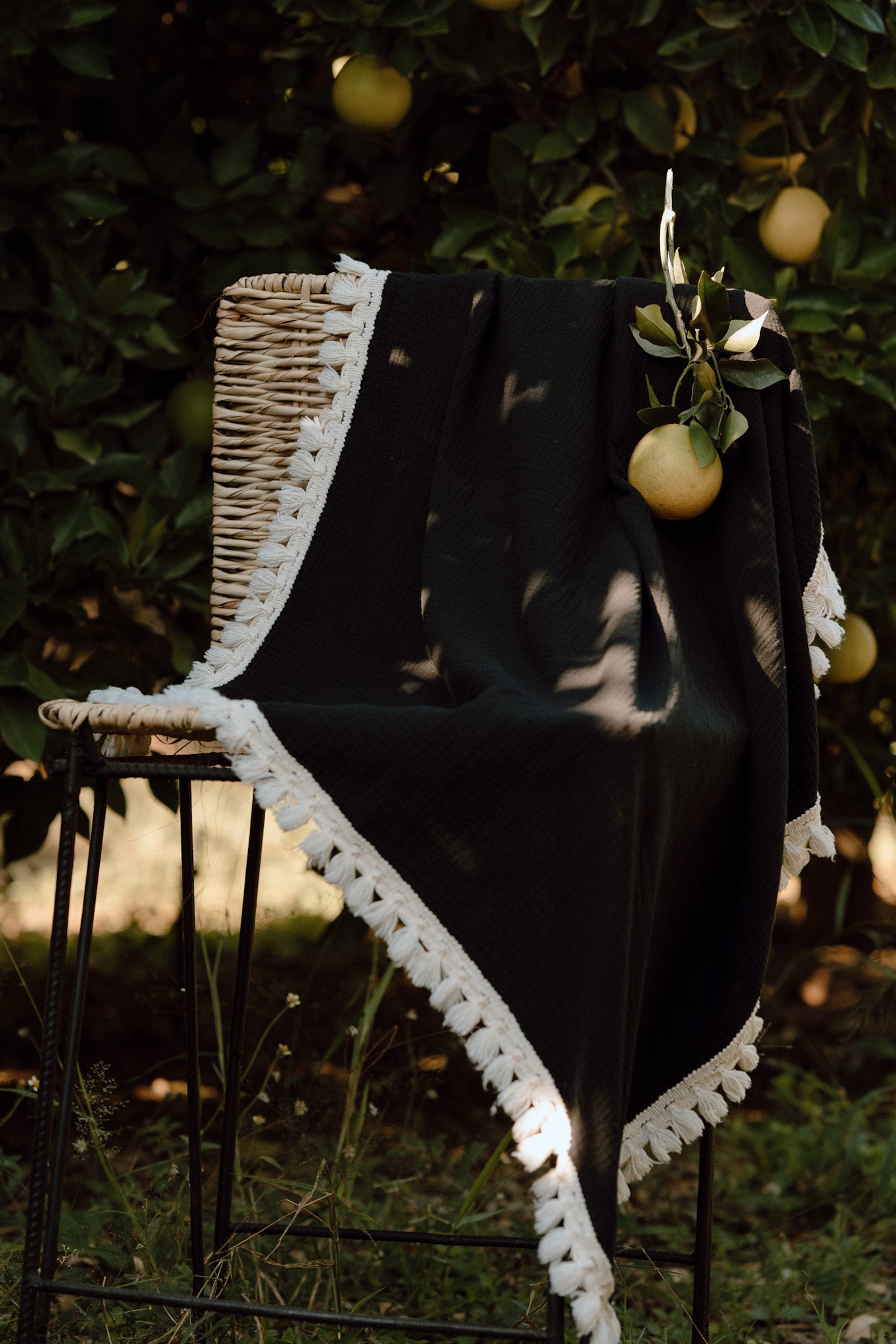 Wanderlust collection: Muslin swaddle with natural fringe detail.