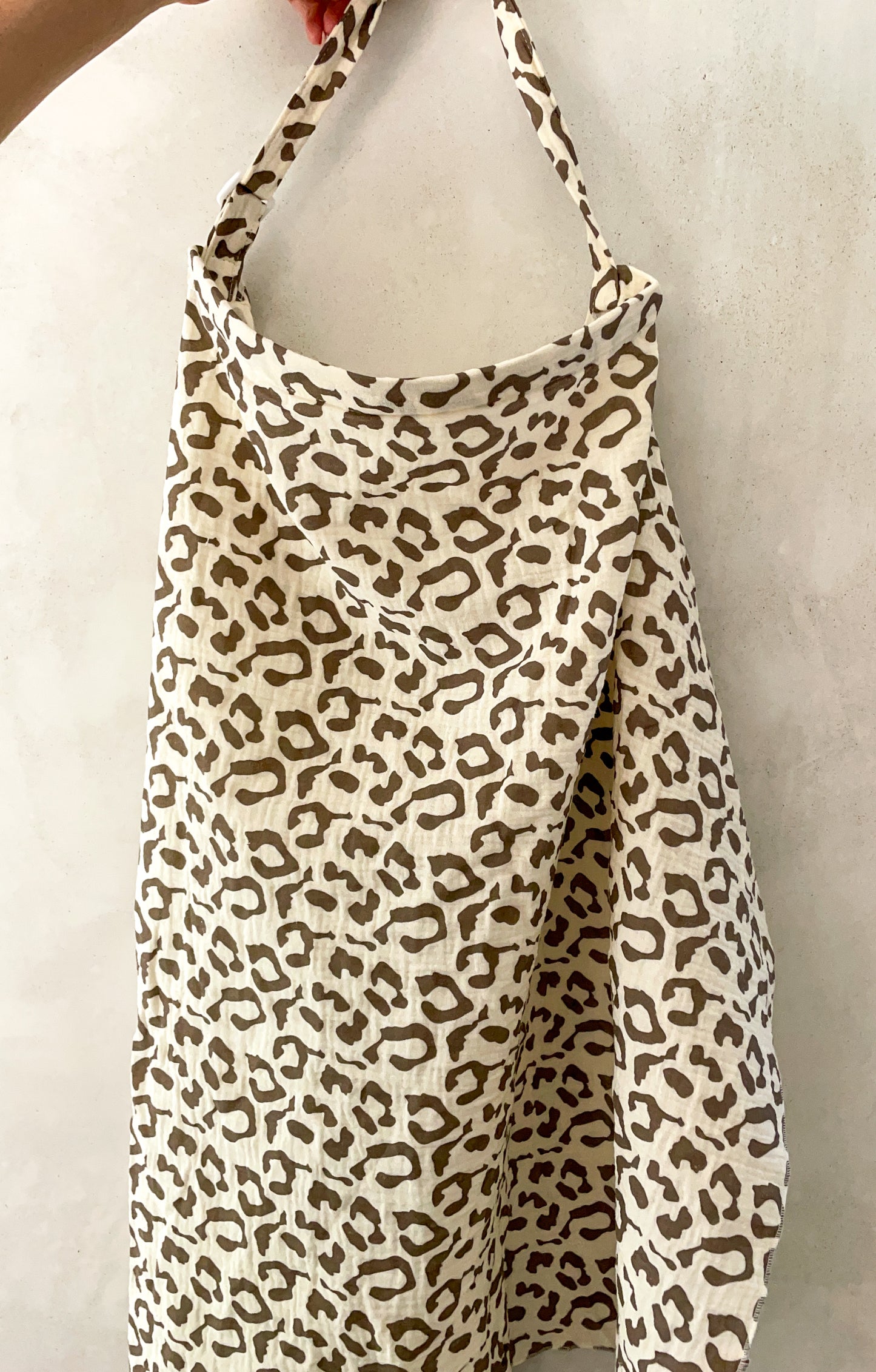 Nursing cover/ breastfeeding cover.