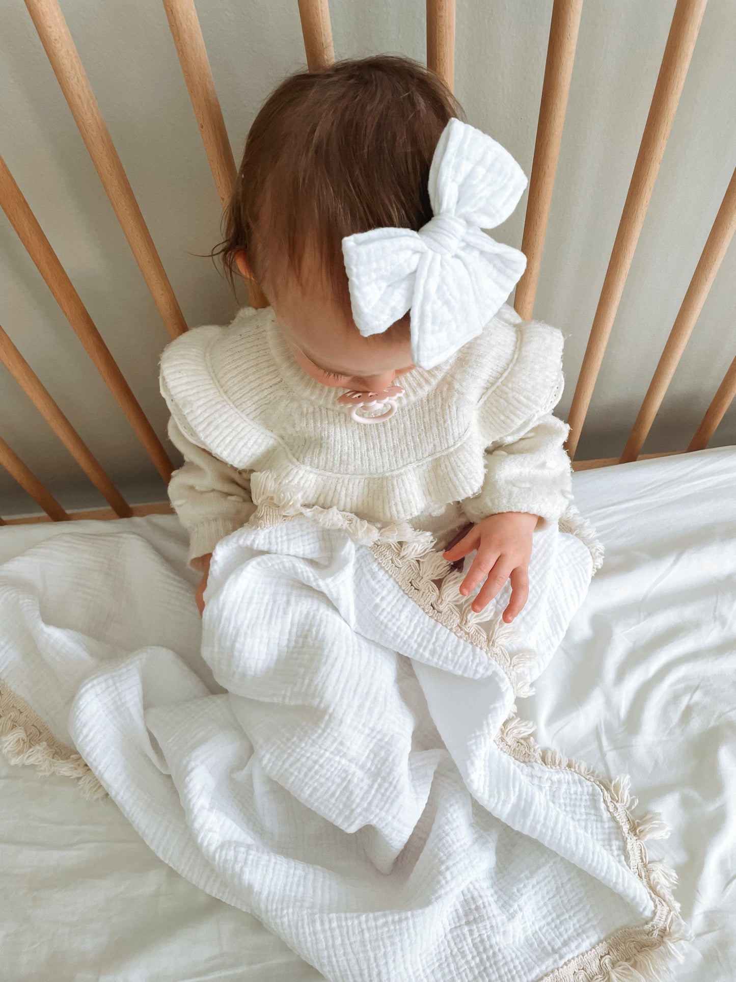 Wanderlust collection: Muslin swaddle with natural fringe detail.